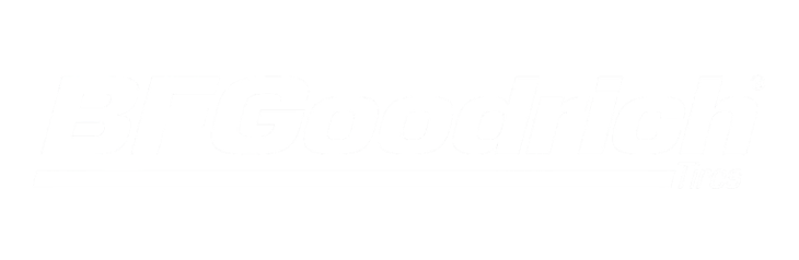 A close-up shot of a small, brown wooden sign with the word 