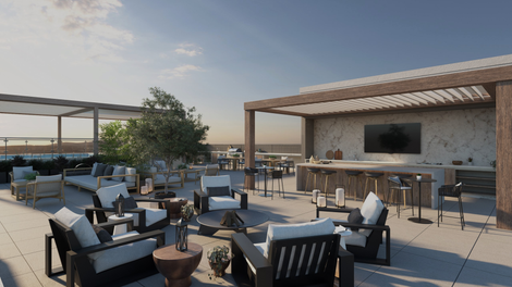 Rooftop deck with seating areas, bar, and pergola under a sunny sky.