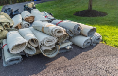 Rolls of carpet that needs to be taken to disposal center in Cheyenne