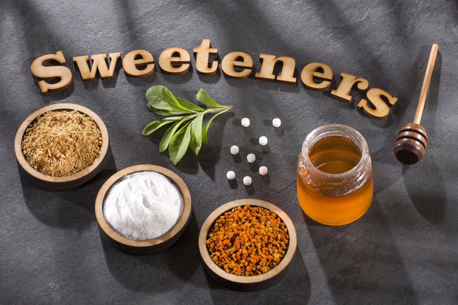 A variety of sweeteners including stevia, honey and sugar cubes