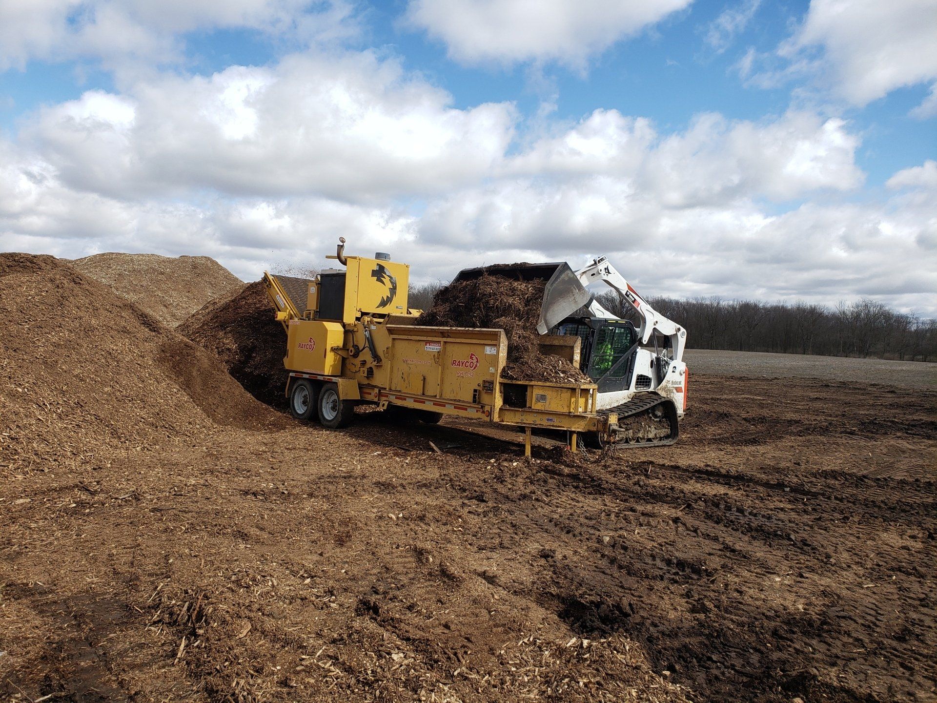 Excavator Flattening the Soil — West Middleton, IN — Rice Tree Company Inc.