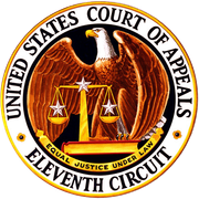 Seal of the United States Court of Appeals for the Eleventh Circuit, with gold border and black text on a blue background Seal of the United States Court of Appeals for the Eleventh Circuit, with gold border and black text on a blue background