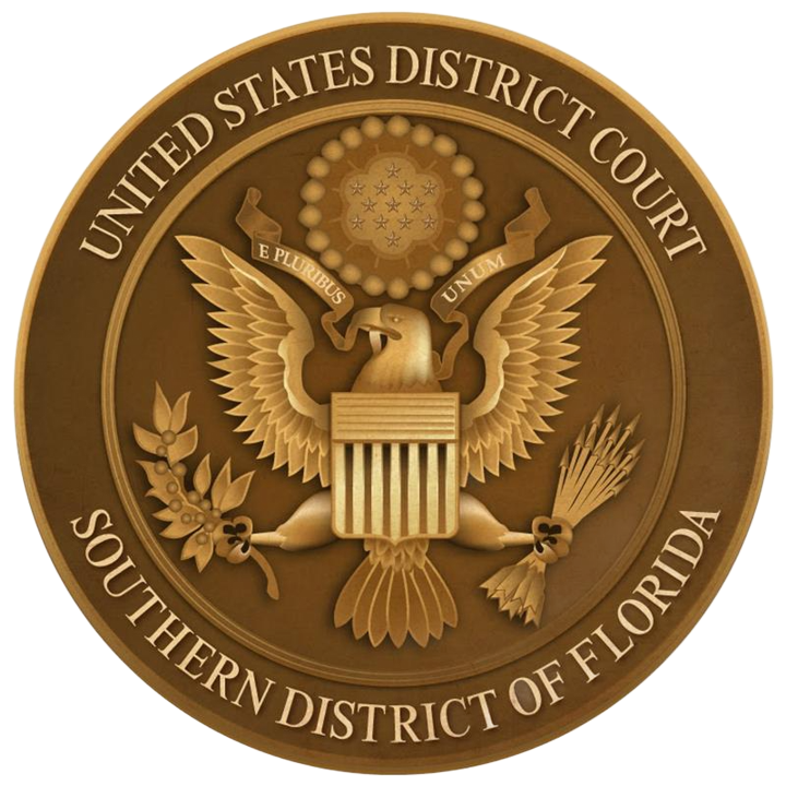 Seal of the U.S. District Court for the Southern District of Florida in gold on a dark background Seal of the U.S. District Court for the Southern District of Florida in gold on a dark background