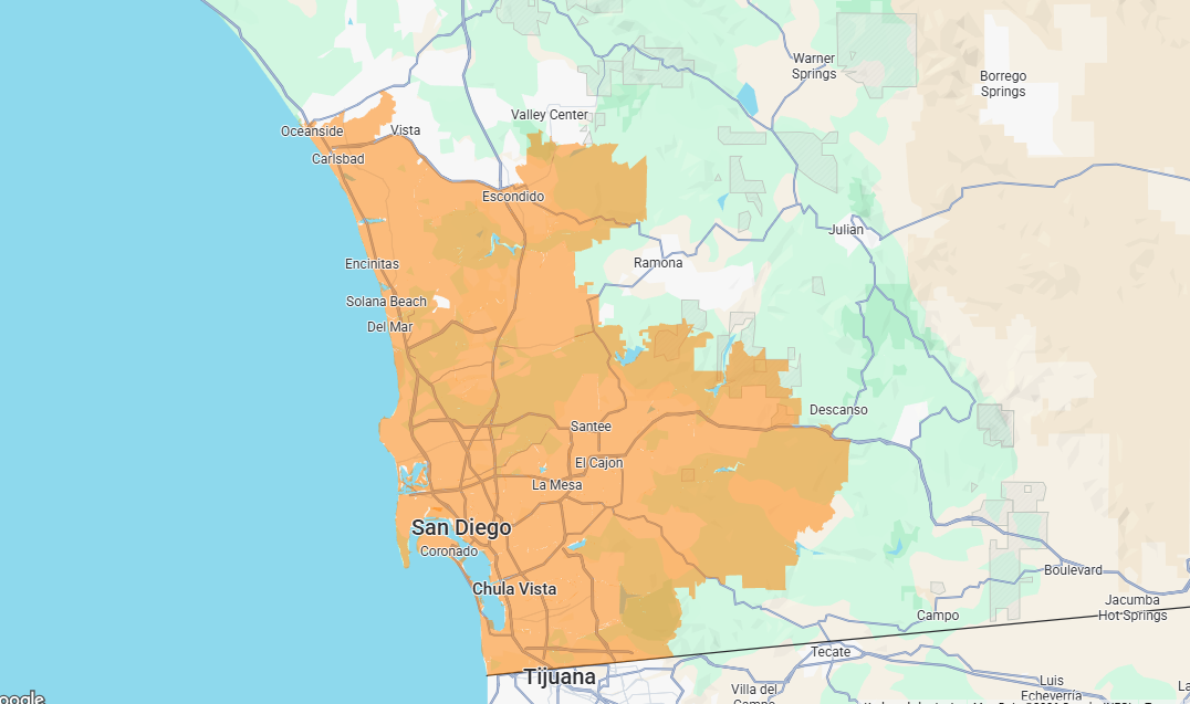 Orange-highlighted map of a coastal region with city labels and roads on a light background