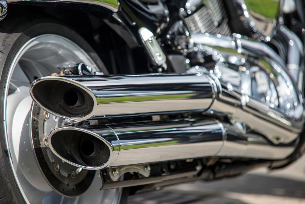 A Close Up of the Exhaust Pipes of a Motorcycle — Alice Crash Repairs In Ciccone, NT