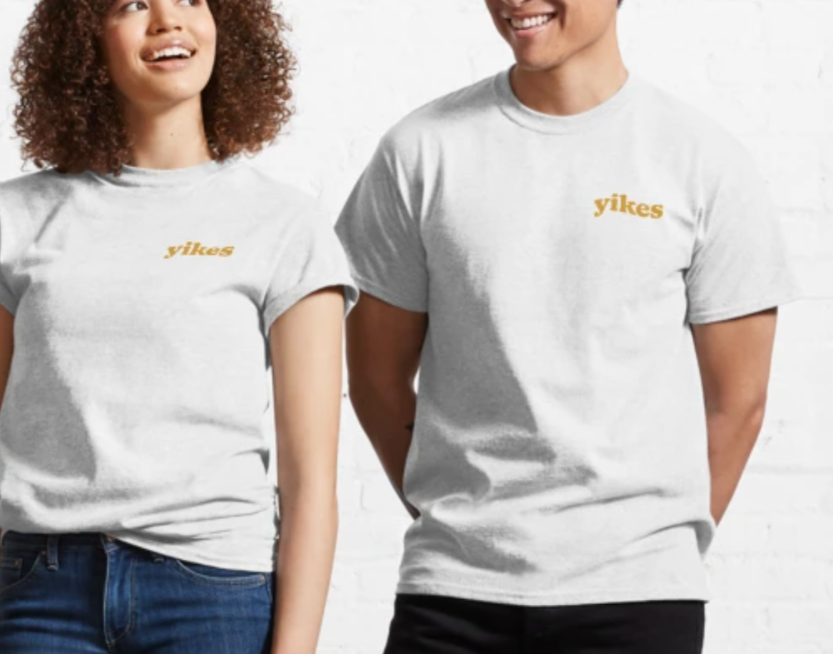 A man and a woman wearing white t-shirts that say yikes