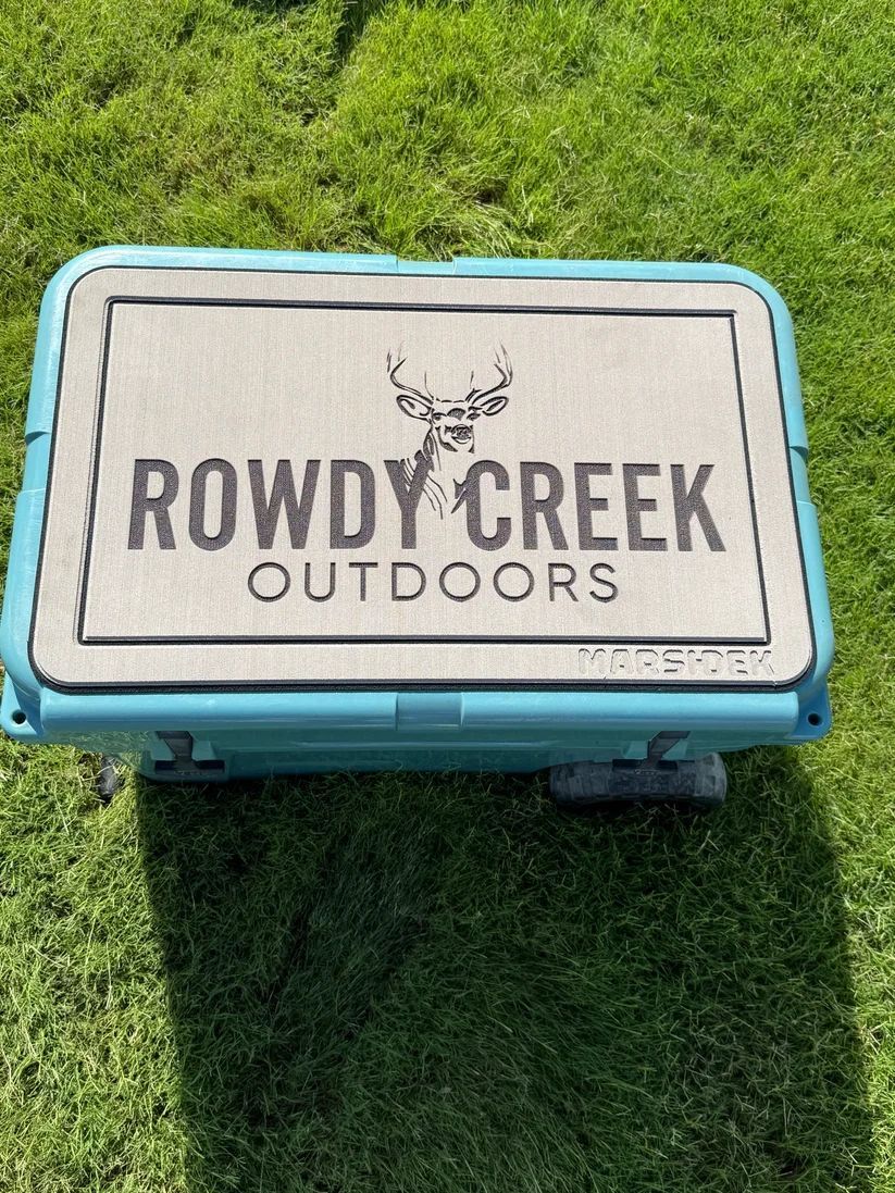 Blue cooler on grass with 