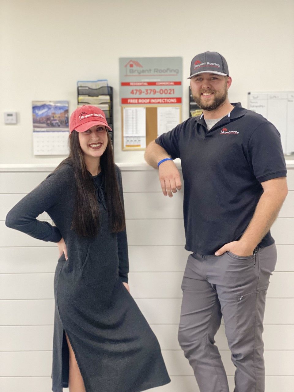 A man and a woman are standing next to each other