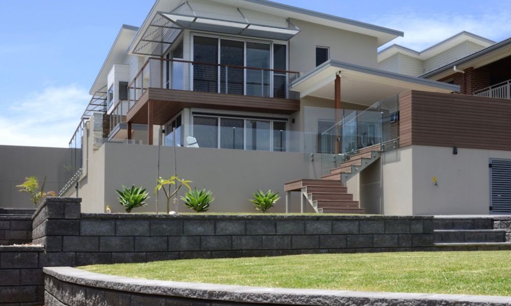 A Large House With Stairs Leading Up — QBC Constructions In Gerringong, NSW