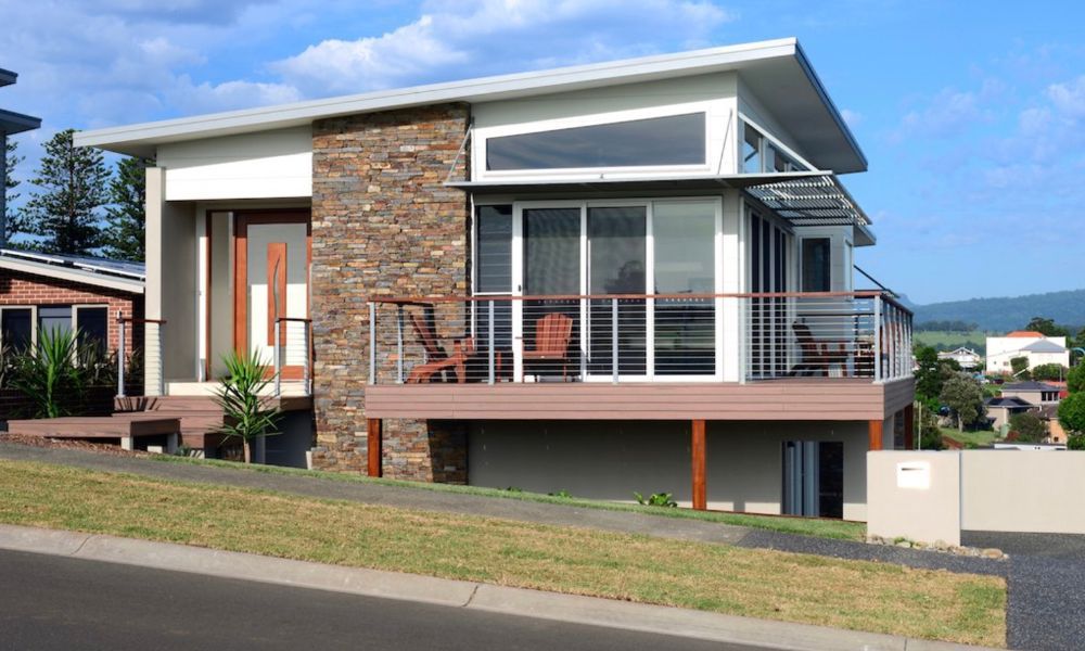 An Artist 's Impression of a House With a Balcony — QBC Constructions In Gerringong, NSW