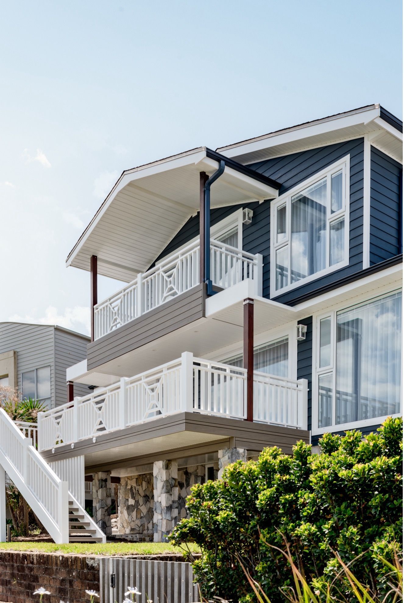 A Large House With a Lot of Windows and Balconies — QBC Constructions In Gables, NSW