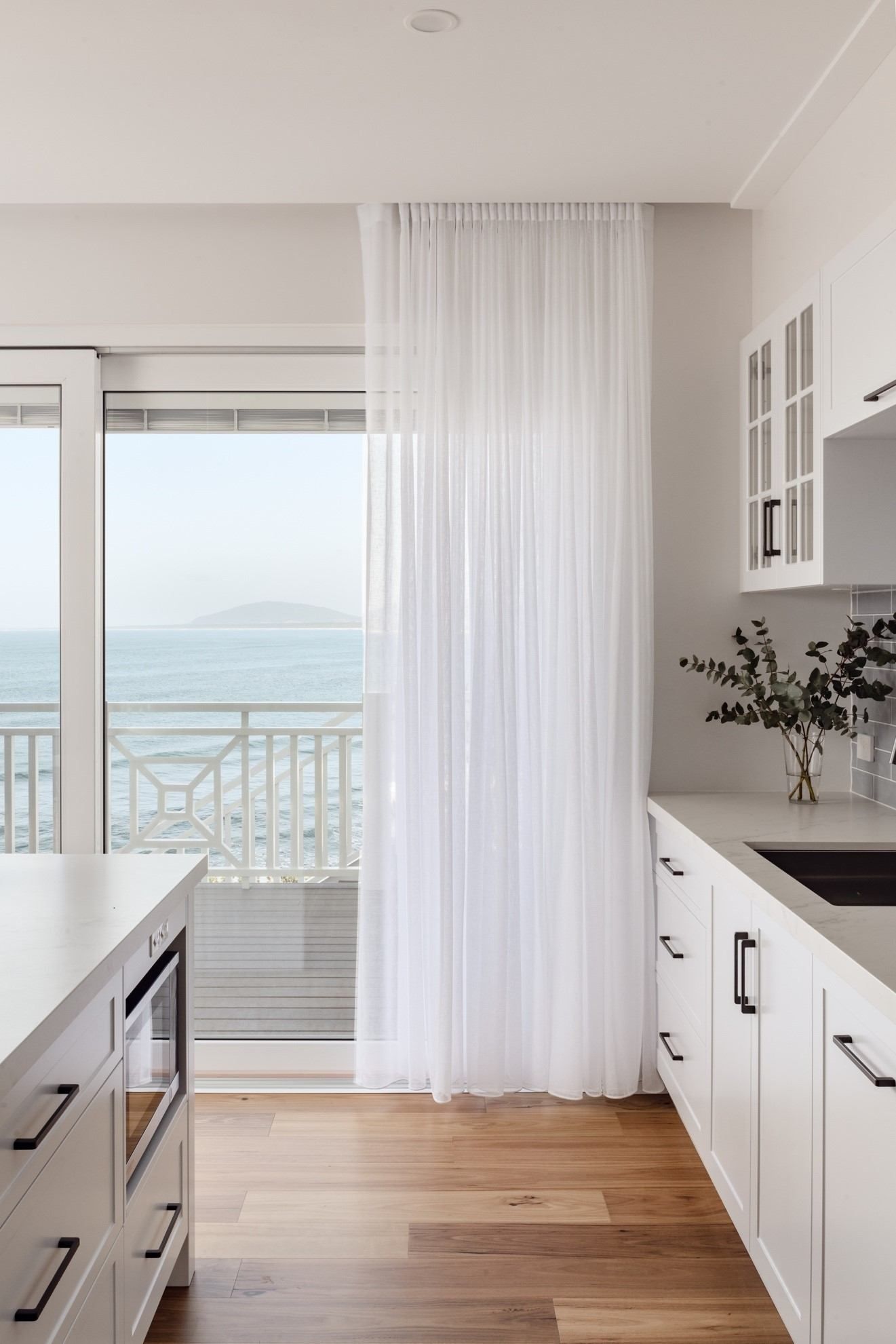 A Kitchen With White Cabinets — QBC Constructions In Gables, NSW