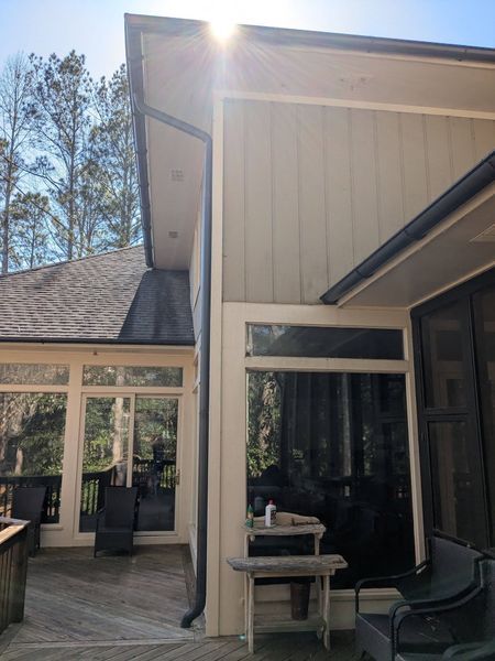 The sun is shining through the windows of a house