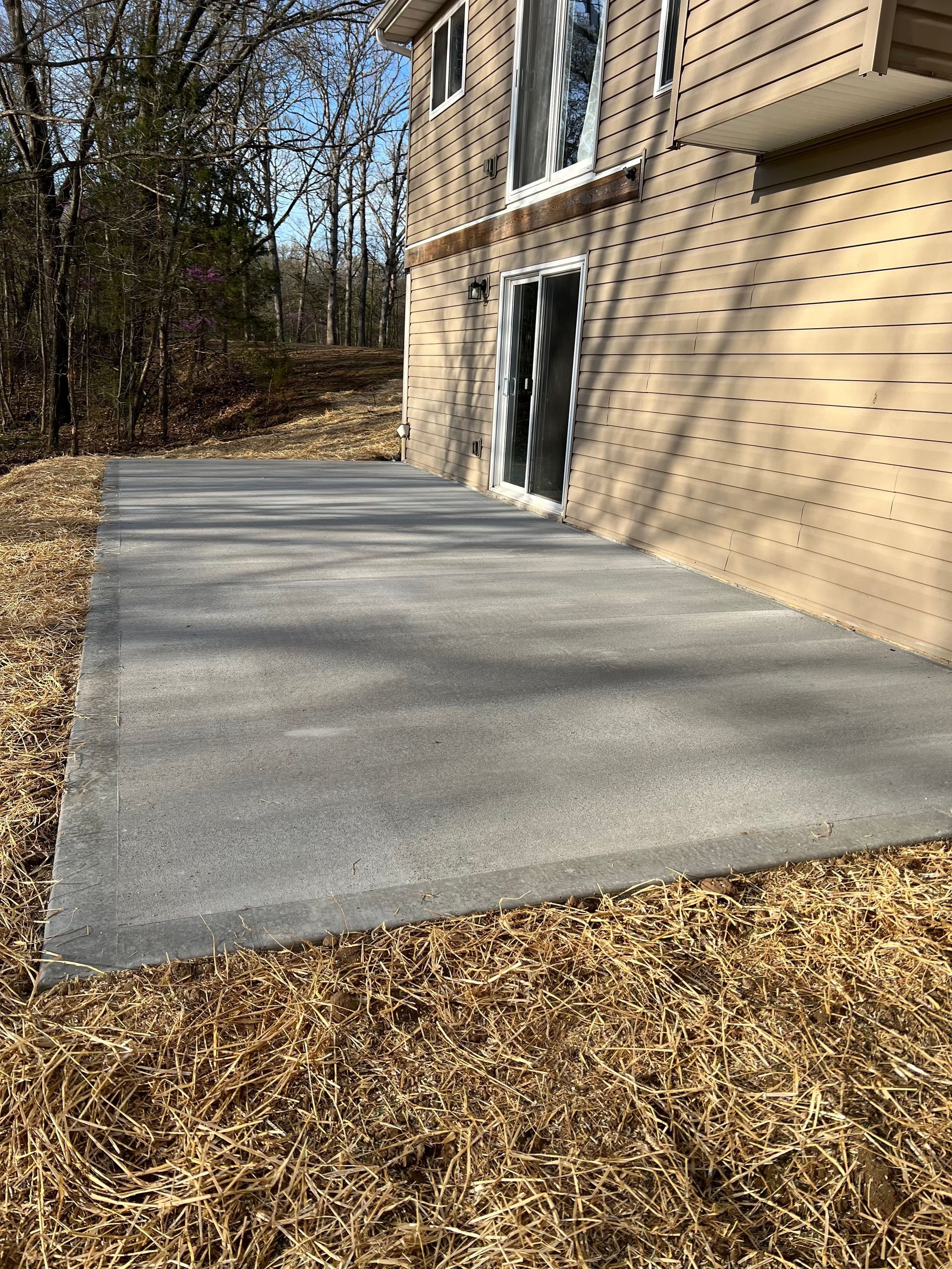Man Laying A Patio — St. Charles, MO — TC Concrete Services