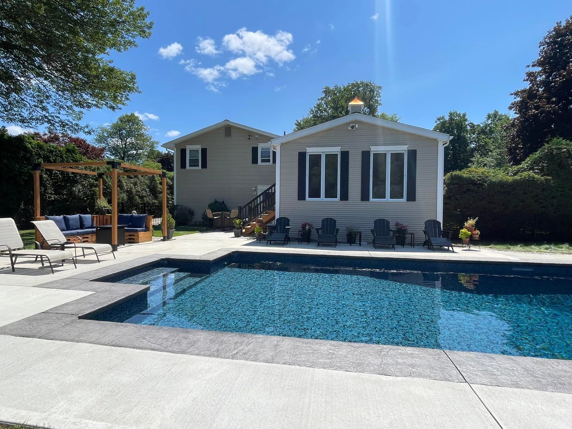 Residential Pool concrete patio by The Concrete Kings