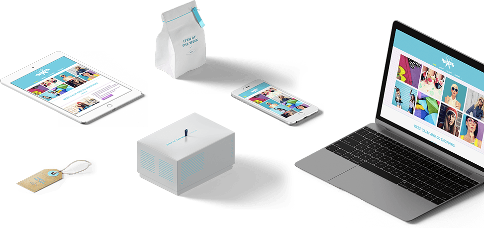 A laptop , tablet , phone , and box are sitting on a table.