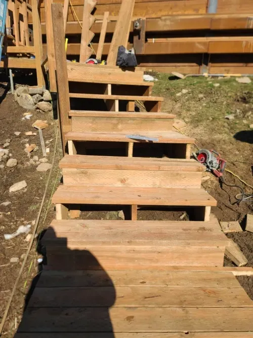 A set of wooden stairs that are being built