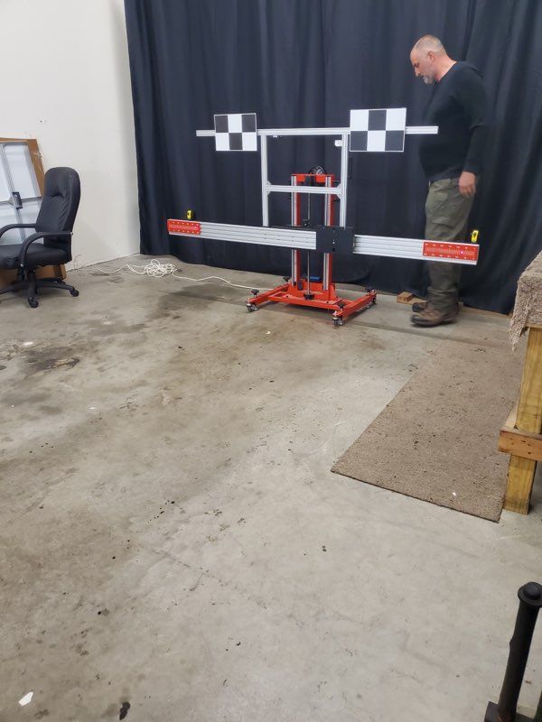 Man Working with Calibration — Fort Myers, FL — A Plus Auto Glass and Collaborations