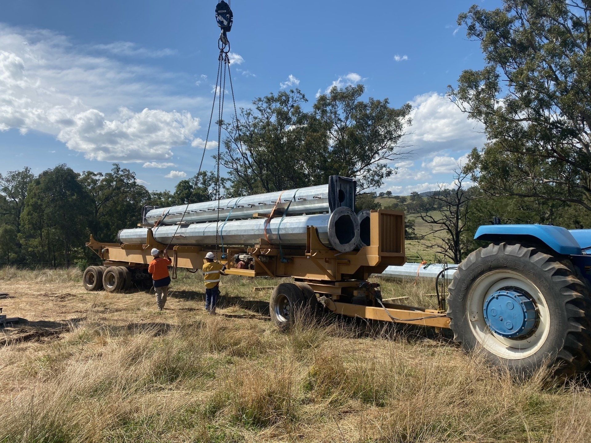 Power Pole Transport in the middle of the field— Seaview Excavations in Hallidays Point, NSW
