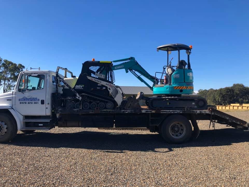 Mini Excavator Loaded on Truck — Seaview Excavations in Hallidays Point, NSW