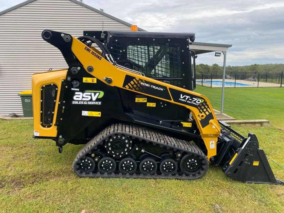 Side View of Mini ASV Posi Track Beside the Residential House — Seaview Excavations in Hallidays Point, NSW