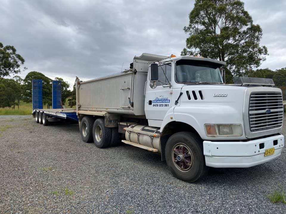 White Tipper Truck Side View — Seaview Excavations in Hallidays Point, NSW