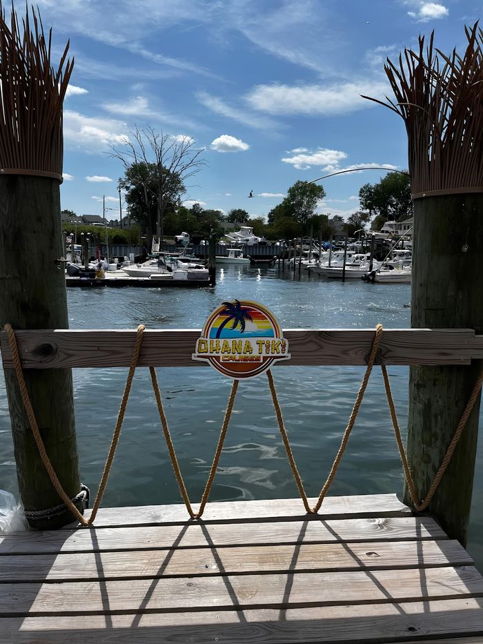 ohana tiki signage on bridge