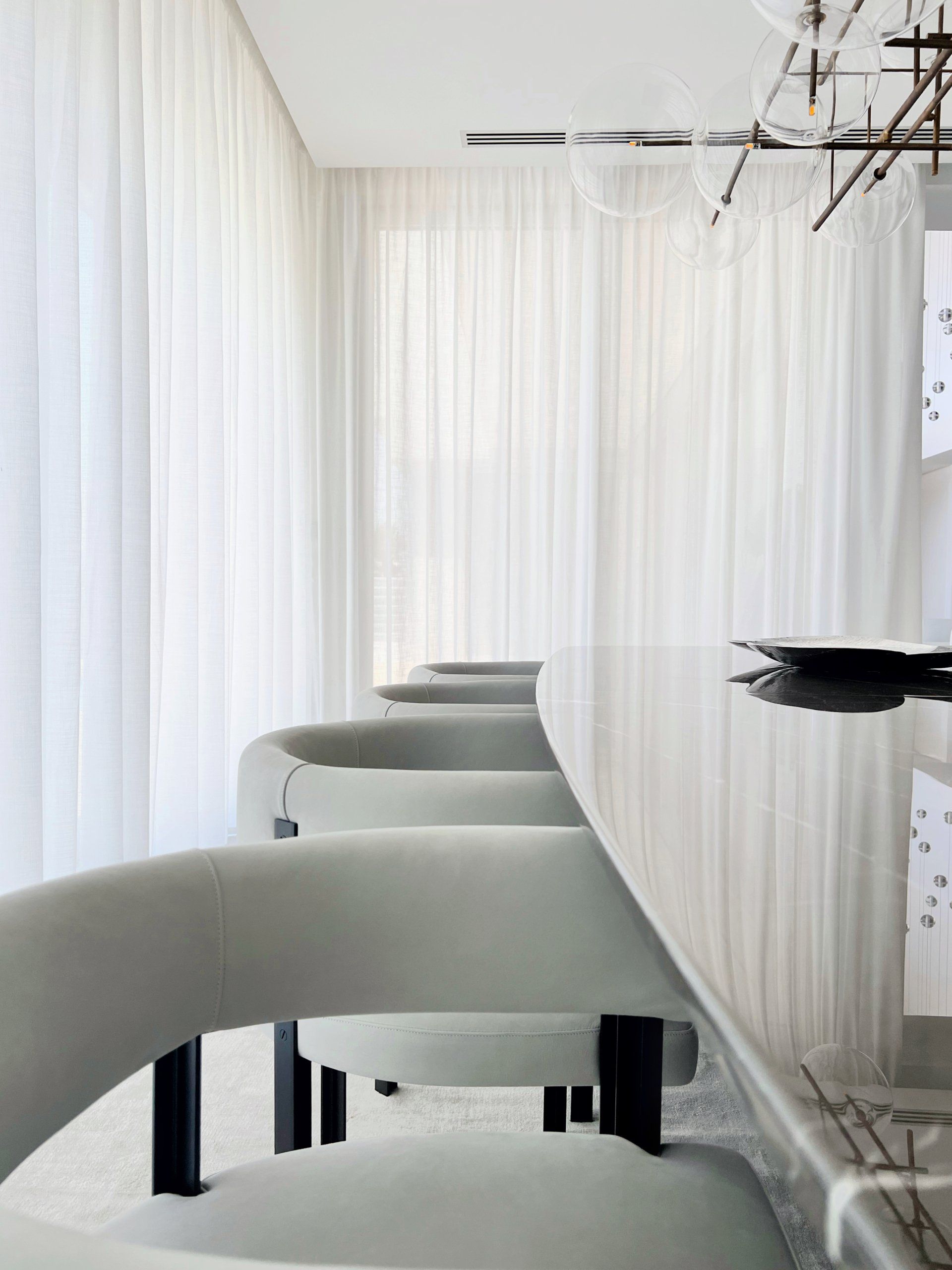 image showing a dining room, with luxury materials like leather, marble