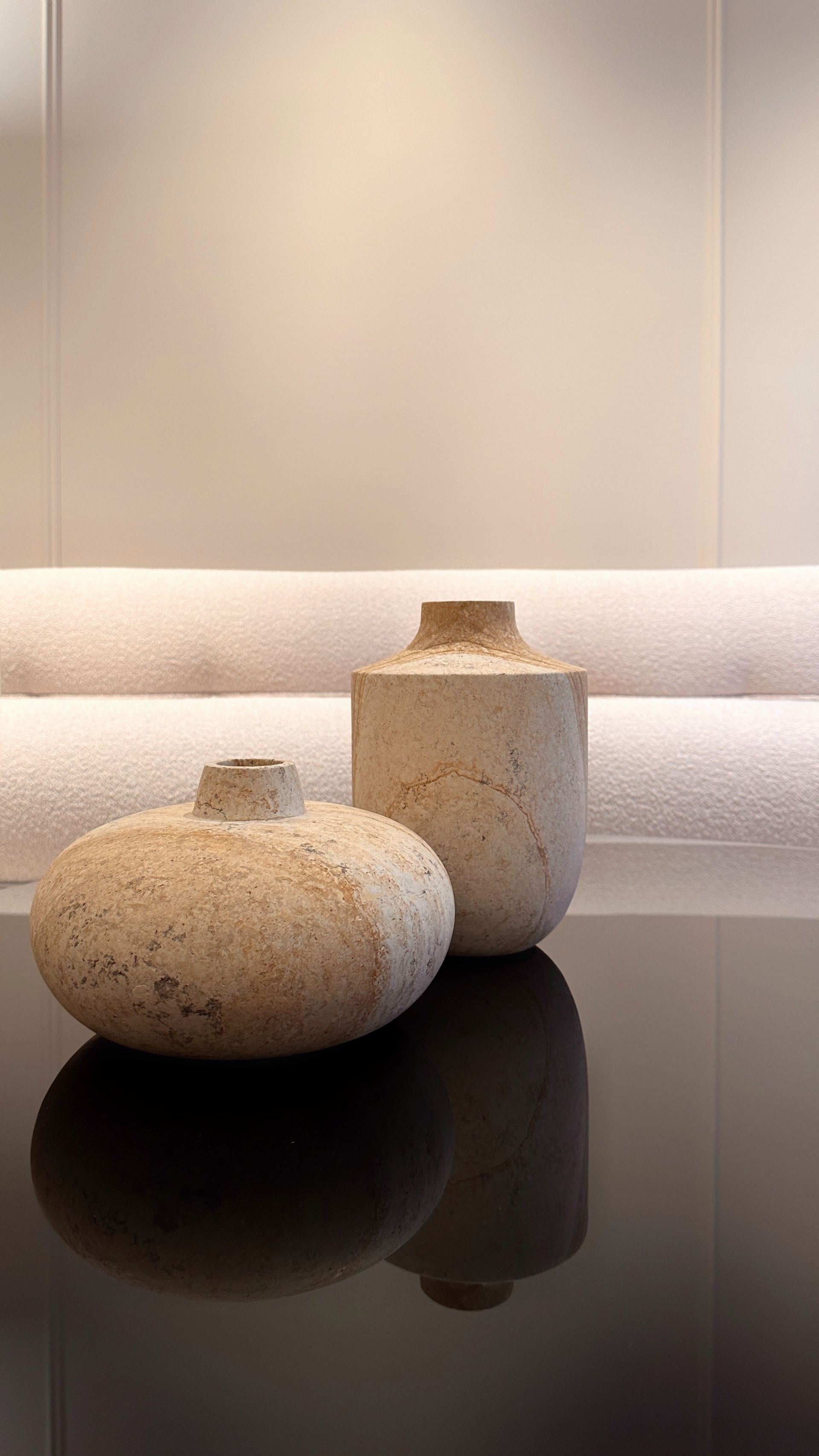 image showing a close-up of travertine vases from Marmi Serafini