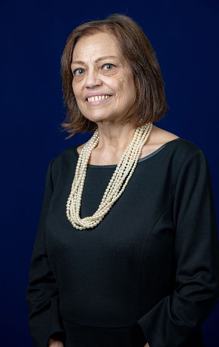 Karen Grava, Secretary