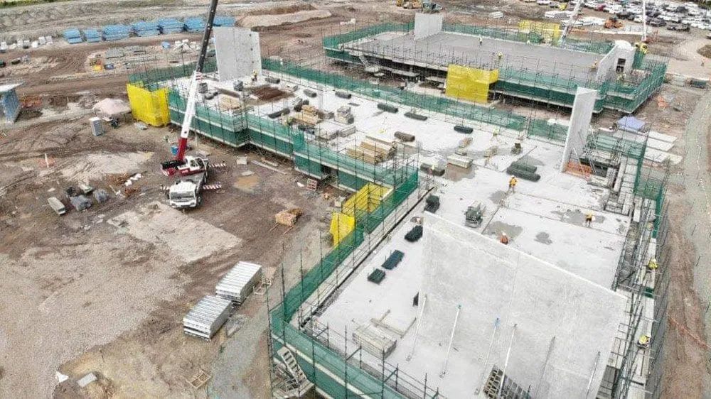 An Aerial View of a Large Building Under Construction — All Coast Scaffolding In Yandina, QLD
