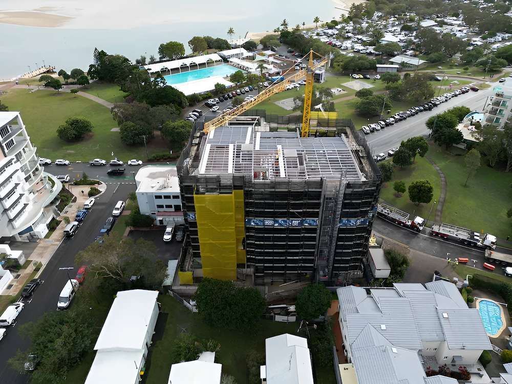 An Aerial View of a Building Under Construction in a City — All Coast Scaffolding In Yandina, QLD