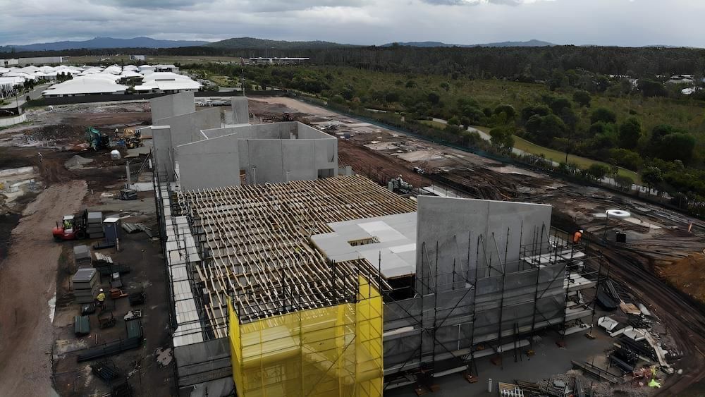 An Aerial View of a Large Building Under Construction — All Coast Scaffolding In Yandina, QLD
