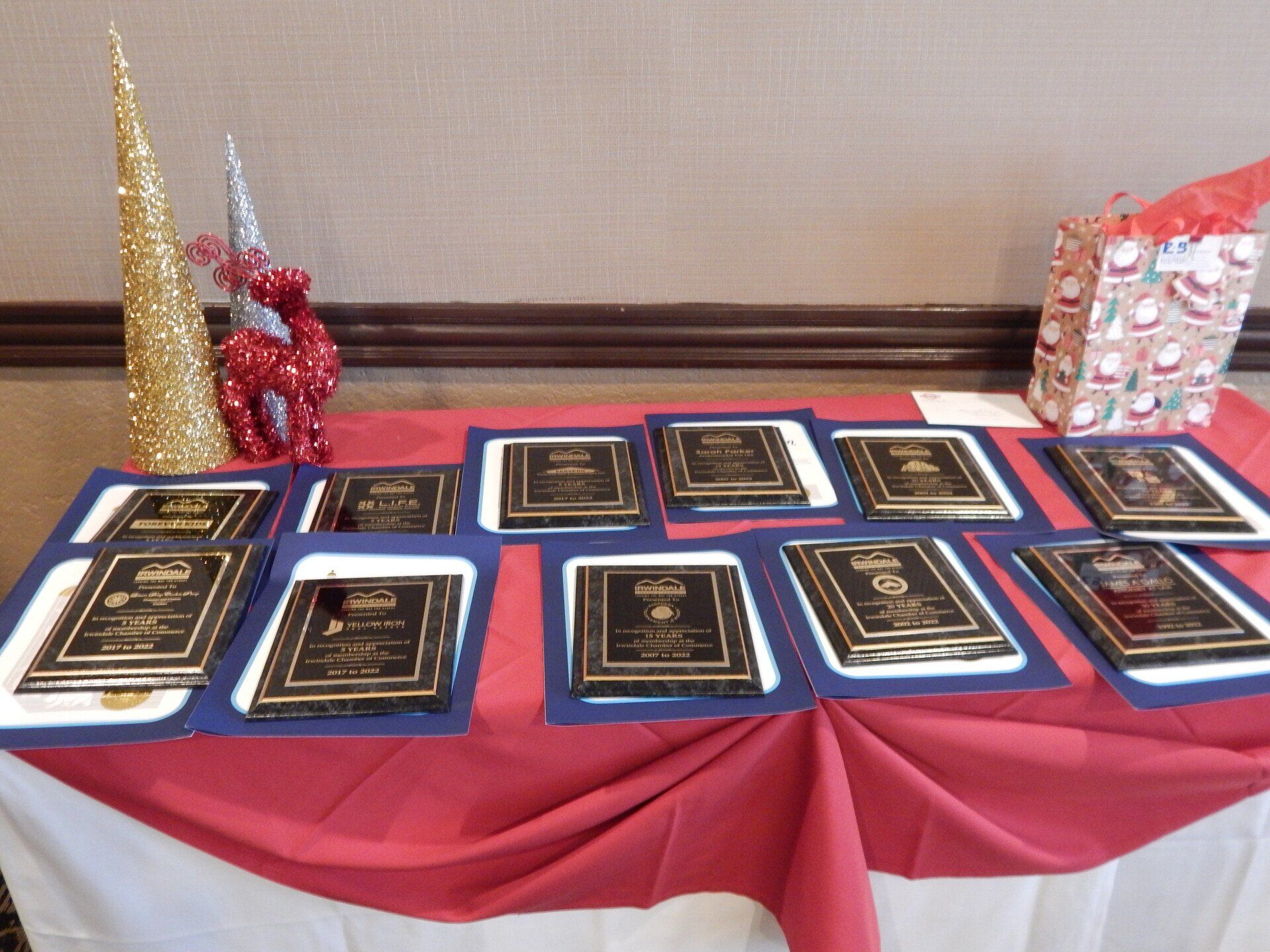 A table with a lot of plaques on it