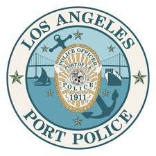 The los angeles port police logo is a badge with an anchor and a bridge.