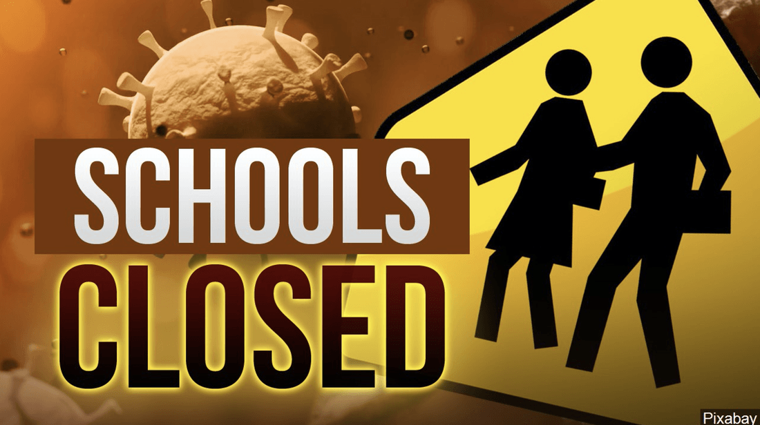 A sign that says schools closed with a virus in the background