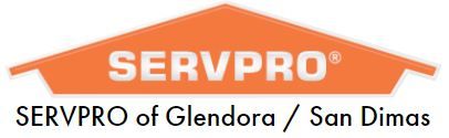 The logo for servpro of glendra / san dimas is orange and white.