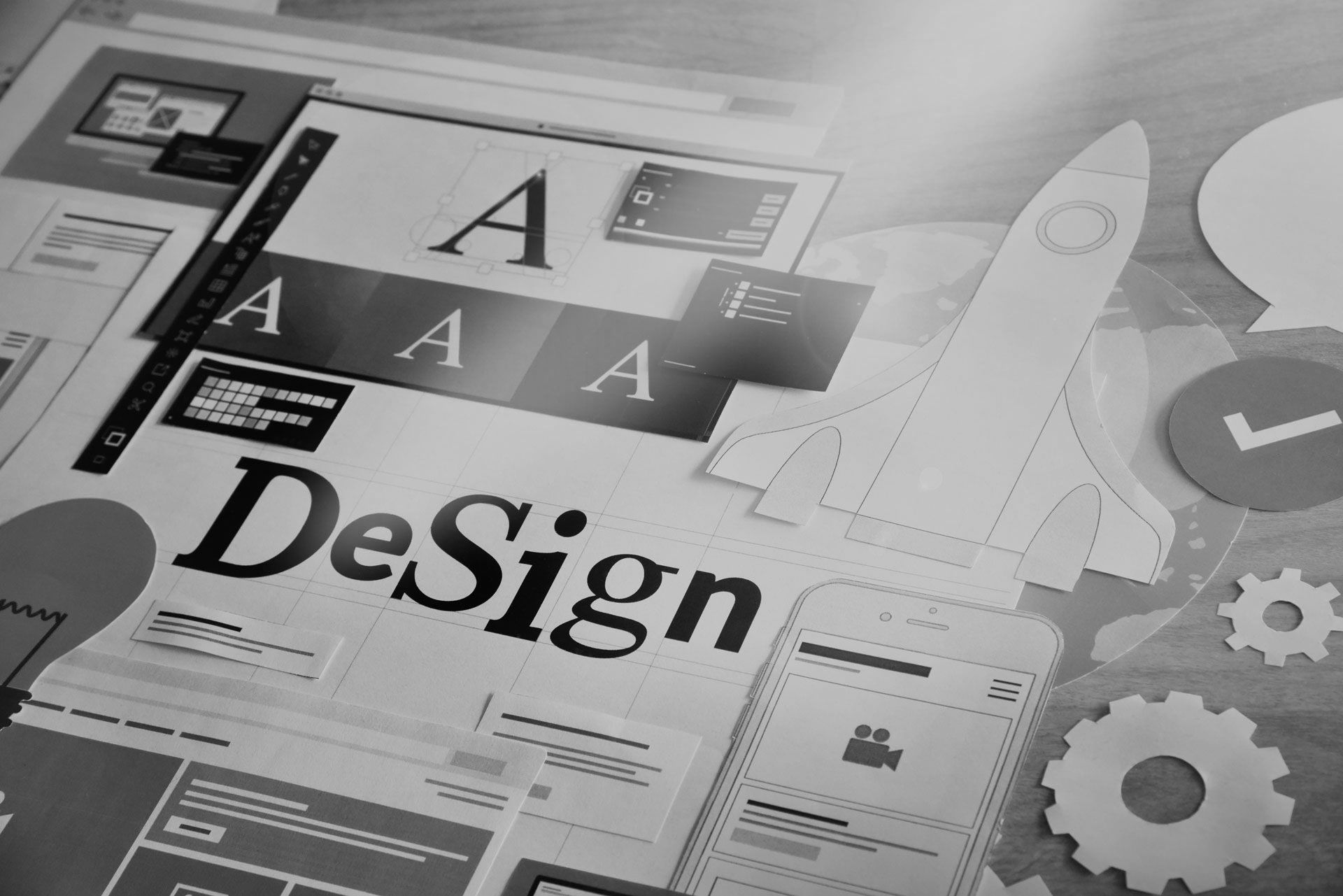 The word design is on a piece of paper
