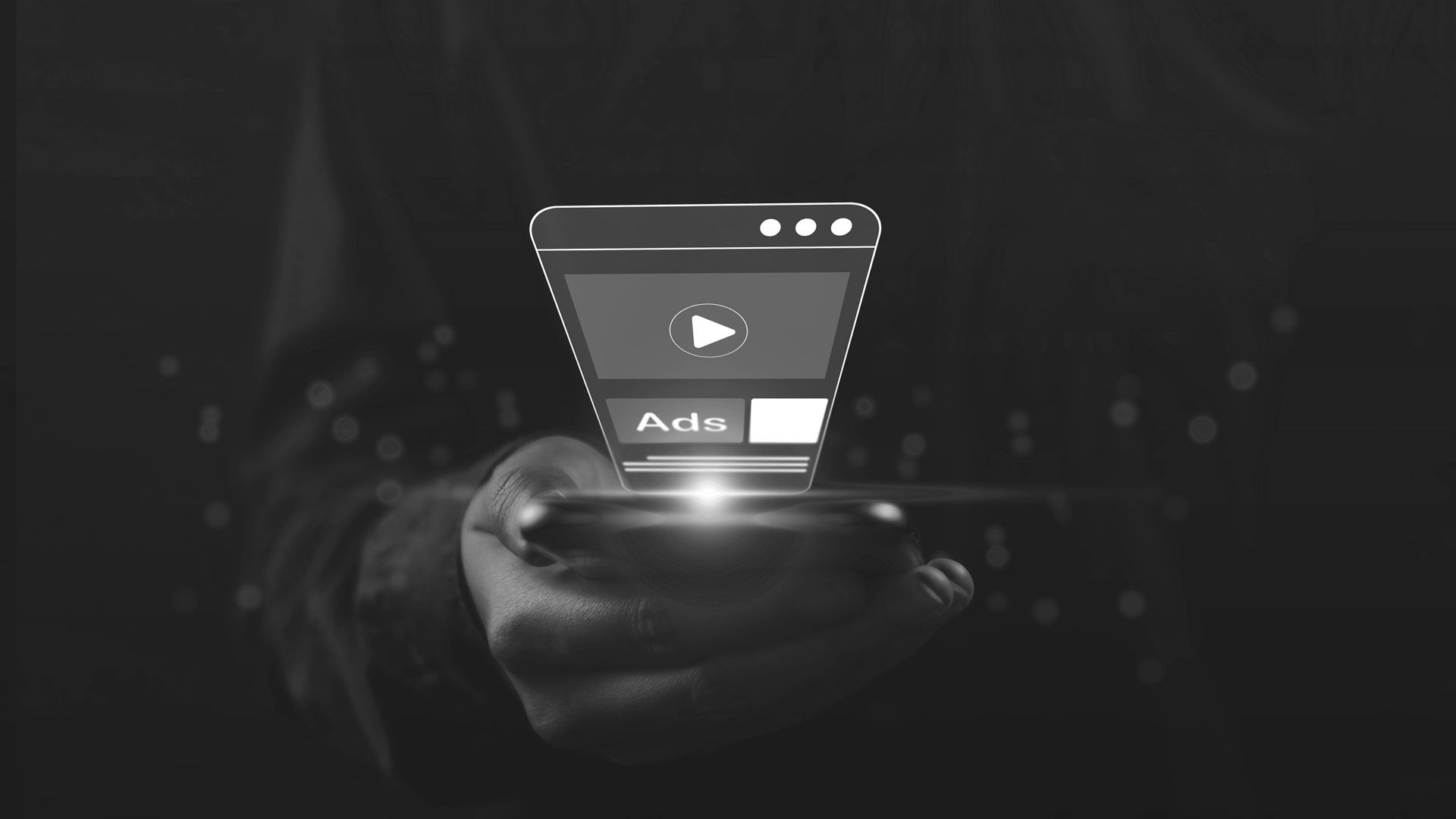 A hand holding a mobile device displaying a digital video player, with 