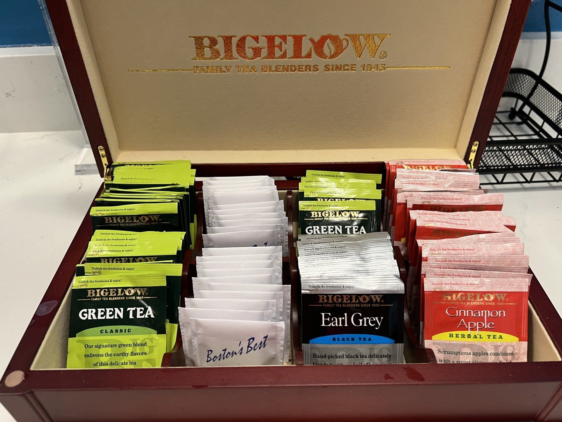 Bigelow tea box with various tea bag flavors, including green tea, Earl Grey, and herbal.