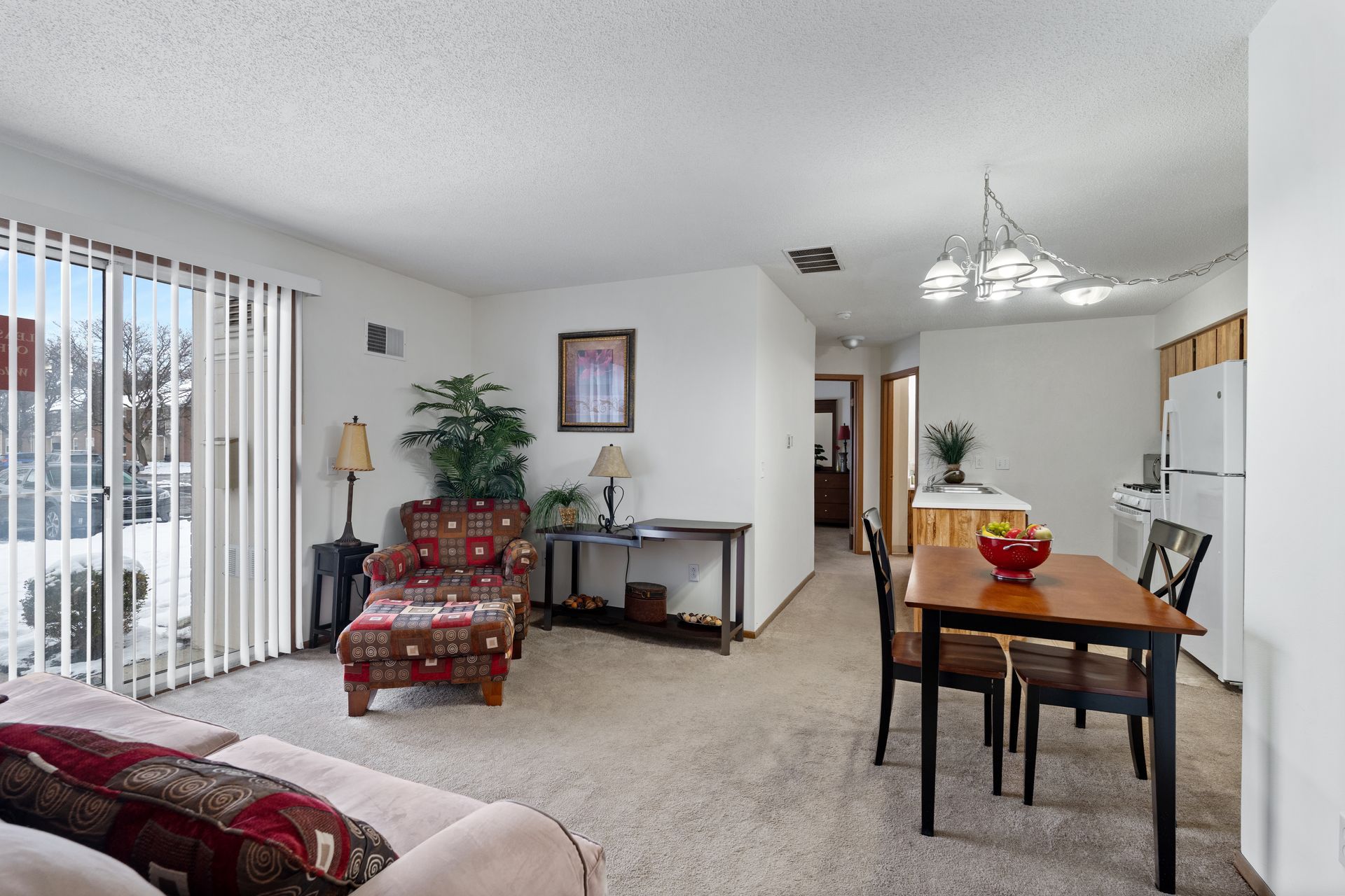 Photo of the living room, dining area and kitchen