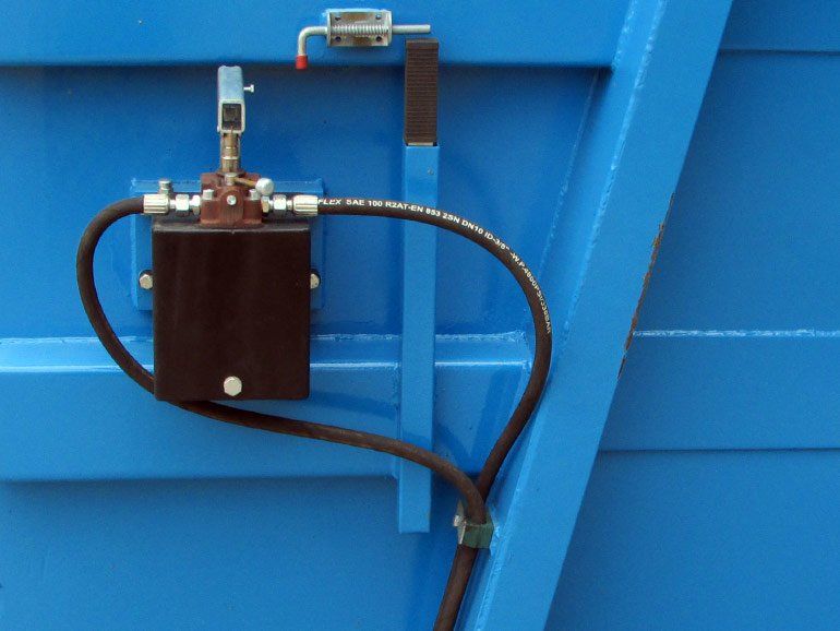 Sludge Container With Auger