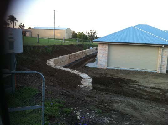 retaining wall with building