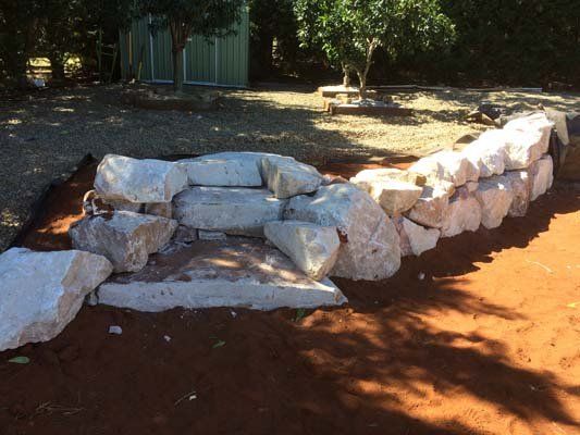 low stone block retaining wall
