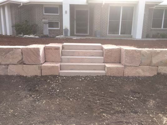 sandstone block wall with stairs