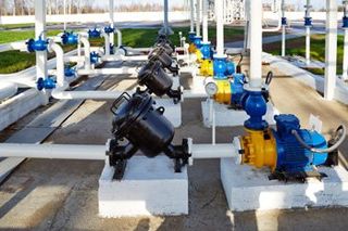 Pipes, pump and filter at oil storage - Water Filtering in Antioch, IL