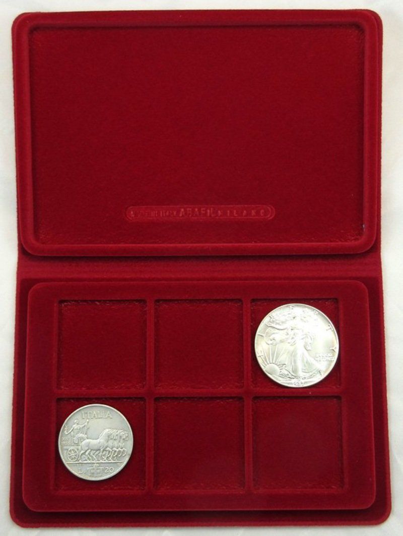 Monete antiche in astuccio di velluto