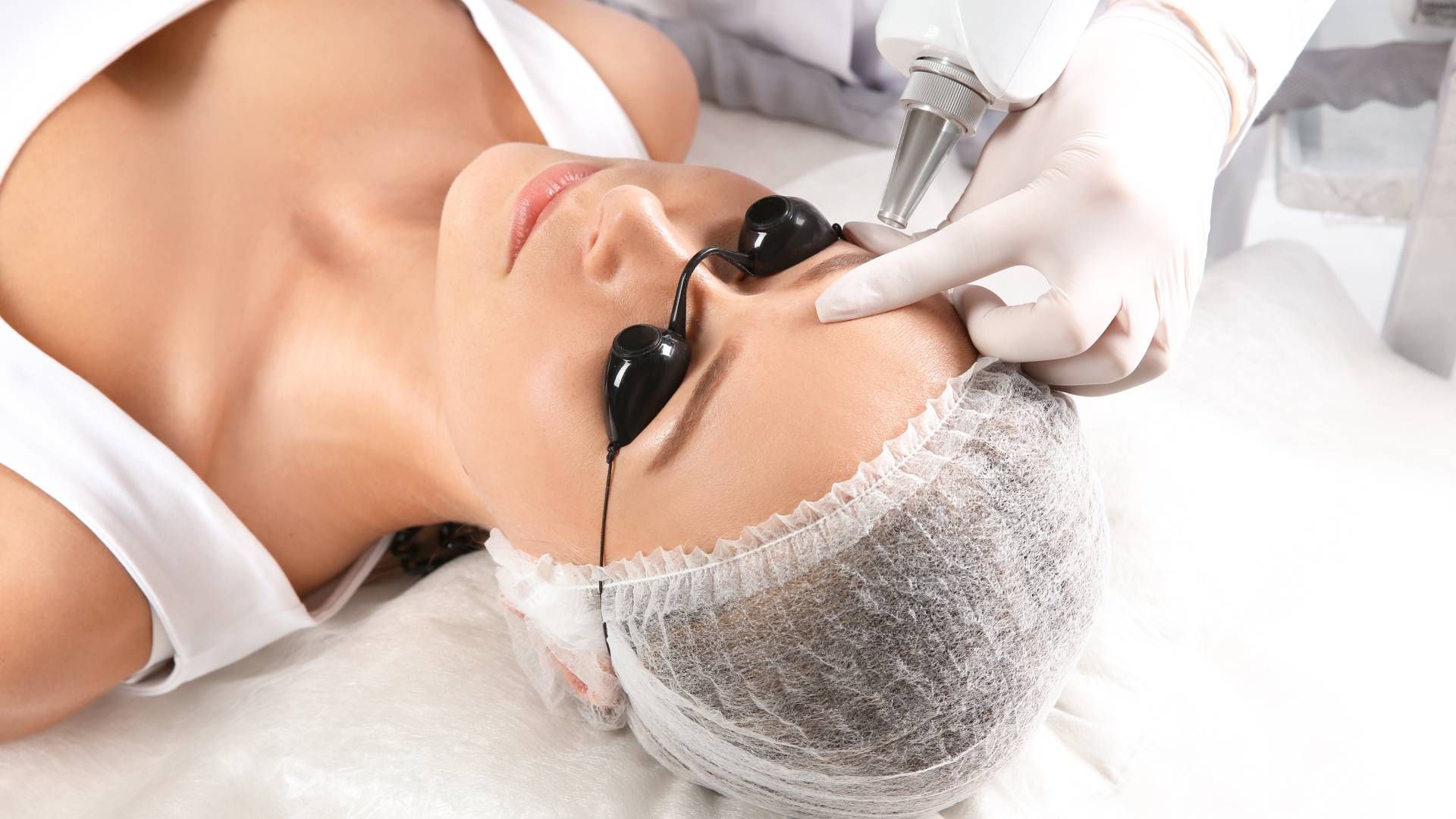 Some receiving a microblading laser removal treatment at Lexington Tattoo Removal near Lexington, Ke