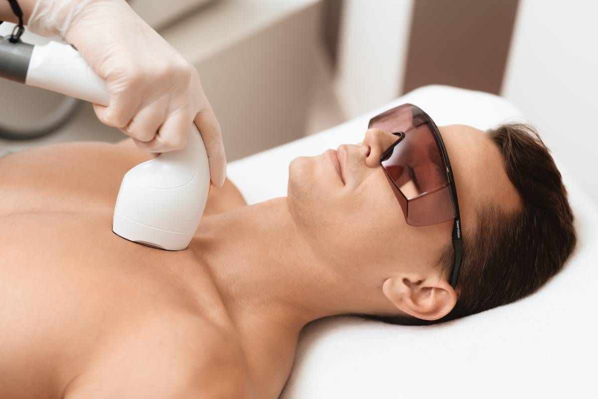 Someone receiving laser hair removal for their neck and chest near Lexington, Kentucky (KY)