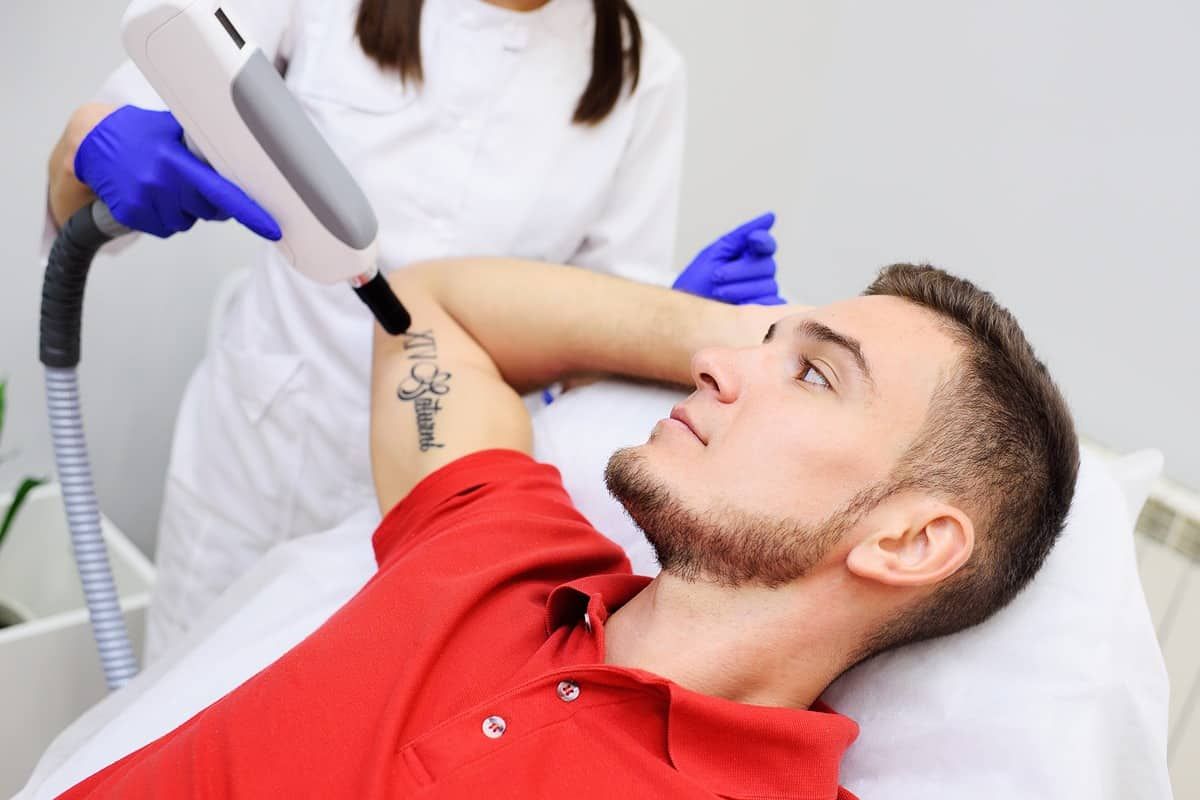 A client getting a tattoo removed near Lexington, Kentucky (KY)